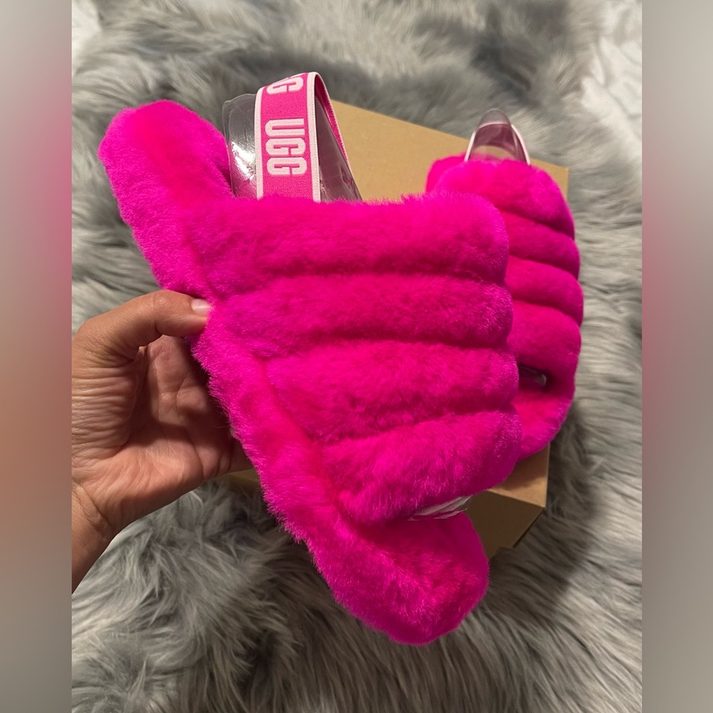 Brand new in a box,UGG slides pink size 4 juniors/ 6 womens
